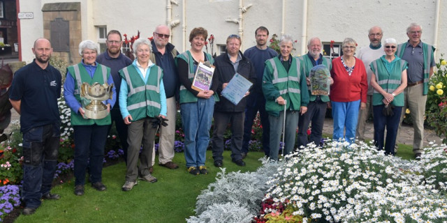 North Berwick in Bloom volunteers and East Lothian Council colleagues with the Rosebowl, awarded for the highest score in Beautiful Scotland 2016 and the Dave Kerr Coastal trophy.  Photo Ian Gooodall.  